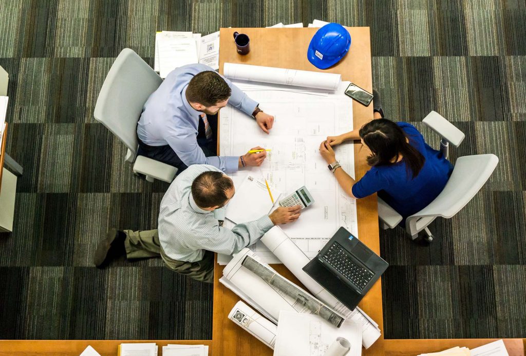 IT disposal staff discussing company goals