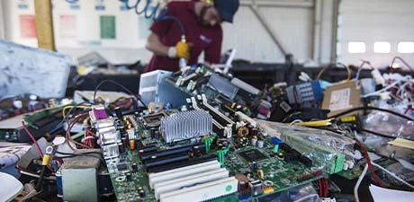 Computer motherboards and components awaiting processing